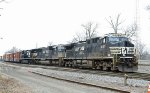 NS 4197 backs train 119 into the yard